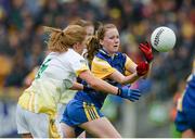 3 May 2014; Laura Fleming, Roscommon, in action against Cathy Carey, Antrim. TESCO Ladies National Football League Division 4 Final, Antrim v Roscommon, O'Connor Park, Tullamore, Co. Offaly. Picture credit: Dáire Brennan / SPORTSFILE