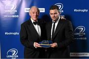 3 May 2014; Fergus McFadden collects a cap for Eoin O’Malley as a farewell present on behalf of Leinster Rugby from Leinster President Paul Deering at the Leinster Rugby Awards Ball. The annual Leinster Rugby Awards Ball Awards Ball took place in the Mansion House, Saturday evening where Jack McGrath was awarded the Bank of Ireland Leinster Rugby Players' Player of the Year and Marty Moore was awarded the Best Menswear Young Player of the Year award. Risteard Cooper was the Master of Ceremonies on a great night which also acknowledged the outstanding contributions of Leo Cullen and Brian O’Driscoll as they retire at the end of the season. For a full list of award winners and more information log on to www.leinsterrugby.ie. Picture credit: Stephen McCarthy / SPORTSFILE