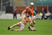 4 May 2014; Denis Murphy, Carlow, with support from team-mate Marty Kavanagh, in action against Conor McFadden, Antrim. GAA All-Ireland Senior Hurling Championship Qualifier Group - Round 2, Carlow v Antrim, Dr. Cullen Park, Carlow. Picture credit: Barry Cregg / SPORTSFILE
