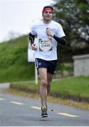 4 May 2014; Dublin footballer Bernard Brogan passes the 8km marker during the Wings For Life World Run. Participants in Killarney joined thousands more in 31 other countries at exactly the same time in the unique running race, all in aid of spinal cord injury research. Killarney, Co. Kerry. Picture credit: Ramsey Cardy / SPORTSFILE