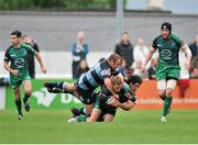 3 May 2014; Gavin Duffy, Connacht, is tackled by Josh Navidi, right, and Scott Andrews, Cardiff Blues. Celtic League 2013/14 Round 21, Connacht v Cardiff Blues, Sportsground, Galway. Picture credit: Ray Ryan / SPORTSFILE
