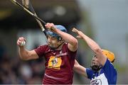 4 May 2014; Robbie Greville, Westmeath, in action against Conor Dunne, Laois. GAA All-Ireland Senior Hurling Championship Qualifier Group - Round 2, Westmeath v Laois, Cusack Park, Mullingar, Co. Westmeath. Picture credit: David Maher / SPORTSFILE