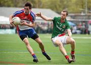 4 May 2014; Niall Farrell, New York, in action against Keith Higgins, Mayo. Connacht GAA Football Senior Championship Preliminary Round, New York v Mayo, Gaelic Park, Bronx, New York, USA. Picture credit: Pat Murphy / SPORTSFILE