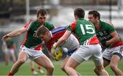 4 May 2014; Keith Scally, New York, in action against Seamus O'Shea, left, Cillian O'Connor, and Tom Parsons, right, Mayo. Connacht GAA Football Senior Championship Preliminary Round, New York v Mayo, Gaelic Park, Bronx, New York, USA. Picture credit: Pat Murphy / SPORTSFILE