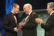 26 February 2006; Stephen Elliott, of Sunderland, is presented with the Young International Player of the Year by David Blood, President, FAI, in the company of Dr Philip Nolan, right, Chief Execitive, eircom, at the 16th eircom / FAI International Soccer Awards. Citywest Hotel, Dublin. Picture credit: David Maher / SPORTSFILE