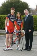 28 February 2006; Irish cycling received a major boost with the launch of the first-ever domestic professional cycling team - Team Murphy and Gunn/Newlyn Group - at the Murphy & Gunn showrooms in Milltown, Dublin. Pictured at the launch are Manchester United manager Sir Alex Ferguson with model Roberta Rowat and team member Urban Monks, left. Murphy & Gunn Garage, Milltown, Dublin. Picture credit: Brendan Moran / SPORTSFILE