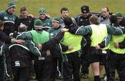 28 February 2006; Eddie O'Sullivan talks to his squad at the end of Ireland rugby squad training as the snow starts to fall. St. Gerard's School, Bray, Co. Wicklow. Picture credit: Brian Lawless / SPORTSFILE
