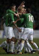 1 March 2006; Damien Duff, Republic of Ireland, celebrates with team-mates Steven Reid, left, Robbie Keane, right, and Ian Harte, hidden, after scoring his sides first goal. International Friendly, Republic of Ireland v Sweden, Lansdowne Road, Dublin. Picture credit: Brian Lawless / SPORTSFILE