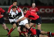 3 March 2006; Johnny Bell, Ulster, is tackled by John O'Sullivan, Munster. Celtic League 2005-2006, Ulster v Munster, Ravenhill, Beflast. Picture credit: Oliver McVeigh / SPORTSFILE