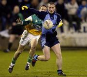 4 March 2006; David O'Callaghan, Dublin, in action against Karol Slattery, Offaly. Allianz National Football League, Division 1A, Round 3, Dublin v Offaly, Parnell Park, Dublin. Picture credit: Damien Eagers / SPORTSFILE