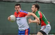 4 May 2014; Gerard McCartan, New York, in action against Kevin McLoughlin, Mayo. Connacht GAA Football Senior Championship Preliminary Round, New York v Mayo, Gaelic Park, Bronx, New York, USA. Picture credit: Pat Murphy / SPORTSFILE