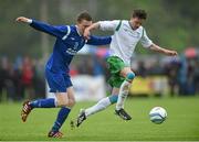 5 May 2014; Aidan Tuohy, Evergreen FC, in action against Ciaran O'Reilly, Nenagh AFC. FAI Umbro Youth Cup Final, Evergreen FC v Nenagh AFC, The Prince Grounds, Castlecomer, Kilkenny. Picture credit: Matt Browne / SPORTSFILE
