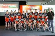 28 February 2006; Irish cycling received a major boost with the launch of the first-ever domestic professional cycling team - Team Murphy and Gunn/Newlyn Group - at the Murphy & Gunn showrooms in Milltown, Dublin. Pictured at the launch is the team with Manchester United manager Sir Alex Ferguson and sponsor Steohen Murphy. Murphy & Gunn Garage, Milltown, Dublin. Picture credit: Brendan Moran / SPORTSFILE