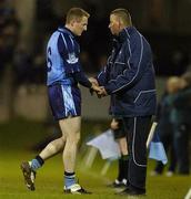 4 March 2006; Dublin manager Paul Caffrey shakes hands with Dublin's Coman Goggins as he is substituted. Allianz National Football League, Division 1A, Round 3, Dublin v Offaly, Parnell Park, Dublin. Picture credit: Damien Eagers / SPORTSFILE