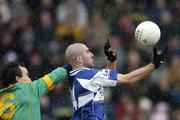 5 March 2006; Barry Brennan, Laois, in action against Anthony Moyles, Meath. Allianz National Football League, Division 1B, Round 3, Meath v Laois, Pairc Tailteann, Navan, Co. Meath. Picture credit: David Maher / SPORTSFILE