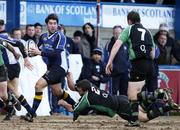 5 March 2006; Brian Blaney, Leinster, is tackled by John Fogarty, 2, and Brendan O'Connor, Connacht. Celtic League 2005-2006, Leinster v Connacht, RDS, Ballsbridge, Dublin. Picture credit: Pat Murphy / SPORTSFILE