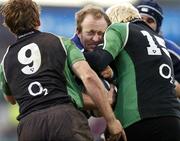 5 March 2006; Denis Hickie, who wins his 100th cap for Leinster, is tackled by Chris Keane, 9, and Matt Mostyn, Connacht. Celtic League 2005-2006, Leinster v Connacht, RDS, Ballsbridge, Dublin. Picture credit: Pat Murphy / SPORTSFILE