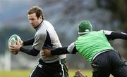 7 March 2006; Full-back Geordan Murphy is tackled by Girvan Dempsey during Ireland rugby squad training. St. Gerard's School, Bray, Co. Wicklow. Picture credit: Brendan Moran / SPORTSFILE