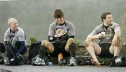 7 March 2006; Lock Donncha O'Callaghan cleans his boots, in the company of Peter Stringer, left, and Marcus Horan, right, after Ireland rugby squad training. St. Gerard's School, Bray, Co. Wicklow. Picture credit: Brendan Moran / SPORTSFILE