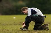 7 March 2006; Captain Brian O'Driscoll ties up his laces during Ireland rugby squad training. St. Gerard's School, Bray, Co. Wicklow. Picture credit: Ciara Lyster / SPORTSFILE