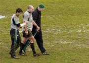 7 March 2006; David Wallace, left, John Hayes, centre, and Paul O'Connell head for the team bus after Ireland rugby squad training. St. Gerard's School, Bray, Co. Wicklow. Picture credit: Ciara Lyster / SPORTSFILE