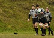 7 March 2006; Donncha O'Callaghan in action, watched by team-mates Simon Easterby and Jerry Flannery, during Ireland rugby squad training. St. Gerard's School, Bray, Co. Wicklow. Picture credit: Ciara Lyster / SPORTSFILE