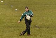 7 March 2006; Out-half Ronan O'Gara kicks a soccer ball after Ireland rugby squad training. St. Gerard's School, Bray, Co. Wicklow. Picture credit: Ciara Lyster / SPORTSFILE