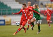 7 May 2014; Ekaterina Dmitrenko, Russia, in action against Julie Ann Russell, Republic of Ireland. FIFA Women's World Cup Qualifier, Republic of Ireland v Russia, Tallaght Stadium, Tallaght, Co. Dublin. Picture credit: Stephen McCarthy / SPORTSFILE