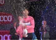 9 May 2014; Svein Tuft, Orica Greenedge, celebrates after being presented with the race leaders pink jersey after stage 1 in the Giro d'Italia 2014. Belfast, Co. Antrim. Picture credit: Stephen McCarthy / SPORTSFILE