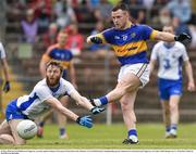 29 May 2016; Kevin O'Halloran of Tipperary in action against Thomas O'Gorman of Waterford in the Munster GAA Football Senior Championship quarter-final between Waterford and Tipperary at Fraher Field, Dungarvan, Co. Waterford. Photo by Matt Browne/Sportsfile