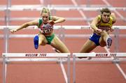 10 March 2006; Ireland's Derval O' Rourke on her way to wining the 60m hurdles ahead of Sweden's Susanna Kallur at the  World Indoor Championships, Moscow. Picture credit: Mark Shearman / SPORTSFILE