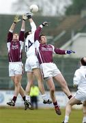 12 March 2006; Michael Foley, Kildare, in action against Niall Coleman, left and Paul Geraghty, Galway. Allianz National Football League, Division 1B, Round 4, Kildare v Galway, St. Conleth's Park, Newbridge, Co. Kildare. Picture credit: Pat Murphy / SPORTSFILE