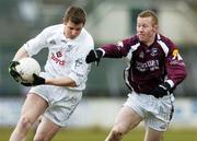 12 March 2006; Karl Ennis, Kildare, in action against Michael Comer, Galway. Allianz National Football League, Division 1B, Round 4, Kildare v Galway, St. Conleth's Park, Newbridge, Co. Kildare. Picture credit: Pat Murphy / SPORTSFILE