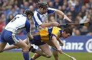12 March 2006; Diarmuid McMahon, Clare, in action against Kevin Moran, 6, and Tom Feeney, Waterford. Allianz National Hurling League, Division 1A, Round 3, Waterford v Clare, Fraher Field, Dungarvan, Co. Waterford. Picture credit: Matt Browne / SPORTSFILE