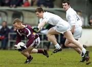 12 March 2006; Michael Comer, Galway, in action against Karl Ennis, Kildare. Allianz National Football League, Division 1B, Round 4, Kildare v Galway, St. Conleth's Park, Newbridge, Co. Kildare. Picture credit: Pat Murphy / SPORTSFILE