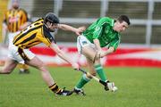 12 March 2006; Conor Fitzgerald, Limerick, in action against Jackie Tyrrell, Kilkenny. Allianz National Hurling League, Division 1B, Round 3, Limerick v Kilkenny, Gaelic Grounds, Limerick. Picture credit: Kieran Clancy / SPORTSFILE