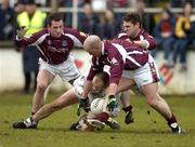 12 March 2006; Glenn Ryan, Kildare, in action against, from left, Damien Burke Richie Fahey, and Paul Clancy, Galway. Allianz National Football League, Division 1B, Round 4, Kildare v Galway, St. Conleth's Park, Newbridge, Co. Kildare. Picture credit: Pat Murphy / SPORTSFILE