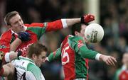12 March 2006; David Heaney, left and Alan Dillon, Mayo, in action against Jonathon McGurn, Fermanagh. Allianz National Football League, Division 1A, Round 4, Mayo v Fermanagh, McHale Park, Castlebar, Co. Mayo. Picture credit: David Maher / SPORTSFILE