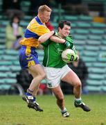 12 March 2006; Pat Ahern, Limerick, in action against Ronan Slattery, Clare. Allianz National Football League, Division 2A, Round 4, Limerick v Clare, Gaelic Grounds, Limerick. Picture credit: Kieran Clancy / SPORTSFILE