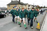12 March 2006; Ciaran McManus leads the Offaly player back to the ground after a warm up. Allianz National Football League, Division 1A, Round 4, Offaly v Tyrone, O'Connor Park, Tullamore, Co. Offaly. Picture credit: Oliver McVeigh / SPORTSFILE