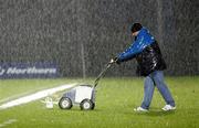 13 March 2006; A Linfield groundsman marks the white lines before the game. Setanta Cup, Group 2, Linfield v Shelbourne, Windsor Park, Belfast. Picture credit: Oliver McVeigh / SPORTSFILE