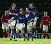 13 March 2006; Michael Gault, 22, Linfield, celebrates scoring a goal with team-mates, from left, Oran Kearney, Jamie Mulgrew, and Tim Mouncy. Setanta Cup, Group 2, Linfield v Shelbourne, Windsor Park, Belfast. Picture credit: Oliver McVeigh / SPORTSFILE