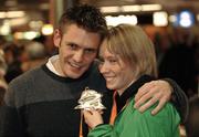 13 March 2006; Derval O'Rourke, who won a gold medal in the 60m Hurdles at the World Indoor Athletics Championships in Moscow, with her boyfriend Kris Stewart on her arrival home at Dublin Airport, Dublin. Picture credit: Ray McManus / SPORTSFILE