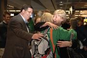13 March 2006; Derval O'Rourke, who won a gold medal in the 60m Hurdles at the World Indoor Athletics Championships in Moscow, with her parents Eva and Terry on her arrival home at Dublin Airport, Dublin. Picture credit: Ray McManus / SPORTSFILE