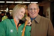13 March 2006; Derval O'Rourke, who won a gold medal in the 60m Hurdles at the World Indoor Athletics Championships in Moscow, with her coach Jim Kilty on her arrival home at Dublin Airport, Dublin. Picture credit: Ray McManus / SPORTSFILE