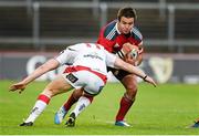 10 May 2014; Gerhard van den Heever, Munster, is tackled by Rory Scholes, Ulster. Celtic League 2013/14, Round 22, Munster v Ulster, Thomond Park, Limerick. Picture credit: Diarmuid Greene / SPORTSFILE