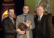 10 March 2006; Francis Flynn, from Leitrim, is presented with his award by GAA President Sean Kelly and Frank Burke, Chairman of the National Referees’ Committee, right, at the National Referees' Awards Banquet. Croke Park, Dublin. Picture credit: Ray McManus / SPORTSFILE