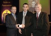 10 March 2006; Declan Magee, from Down, is presented with his award by GAA President Sean Kelly and Frank Burke, Chairman of the National Referees’ Committee, right, at the National Referees' Awards Banquet. Croke Park, Dublin. Picture credit: Ray McManus / SPORTSFILE