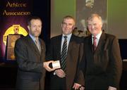 10 March 2006; Pat Green, from Galway, is presented with his award by GAA President Sean Kelly and Frank Burke, Chairman of the National Referees’ Committee, right, at the National Referees' Awards Banquet. Croke Park, Dublin. Picture credit: Ray McManus / SPORTSFILE