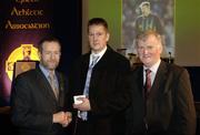 10 March 2006; Sean Whelan, from Wexford, is presented with his award by GAA President Sean Kelly and Frank Burke, Chairman of the National Referees’ Committee, right, at the National Referees' Awards Banquet. Croke Park, Dublin. Picture credit: Ray McManus / SPORTSFILE
